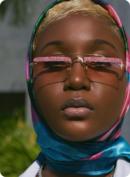 gallery image 1: beautiful model with pink glasses