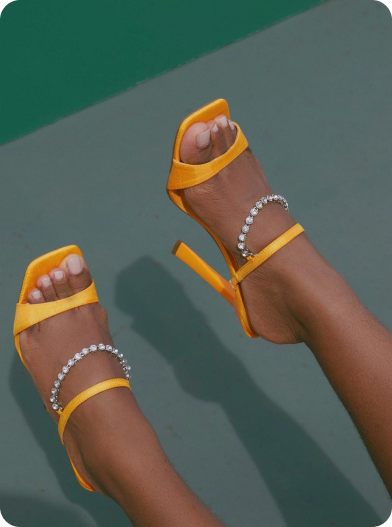 gallery image 5: a pair of yellow heels