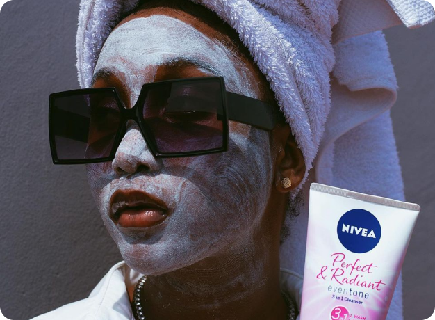 gallery image 8: beautiful model using nivea cream and head towel